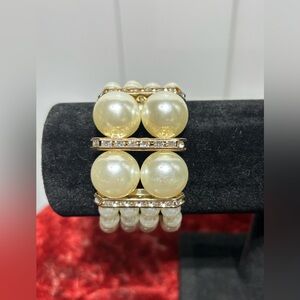Gold tone and faux pearl stretch bracelet with crystals